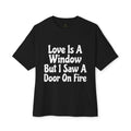 Graphic Tee — "Love Is A Window But I Saw A Door On Fire" Oversized Boxy Shirt